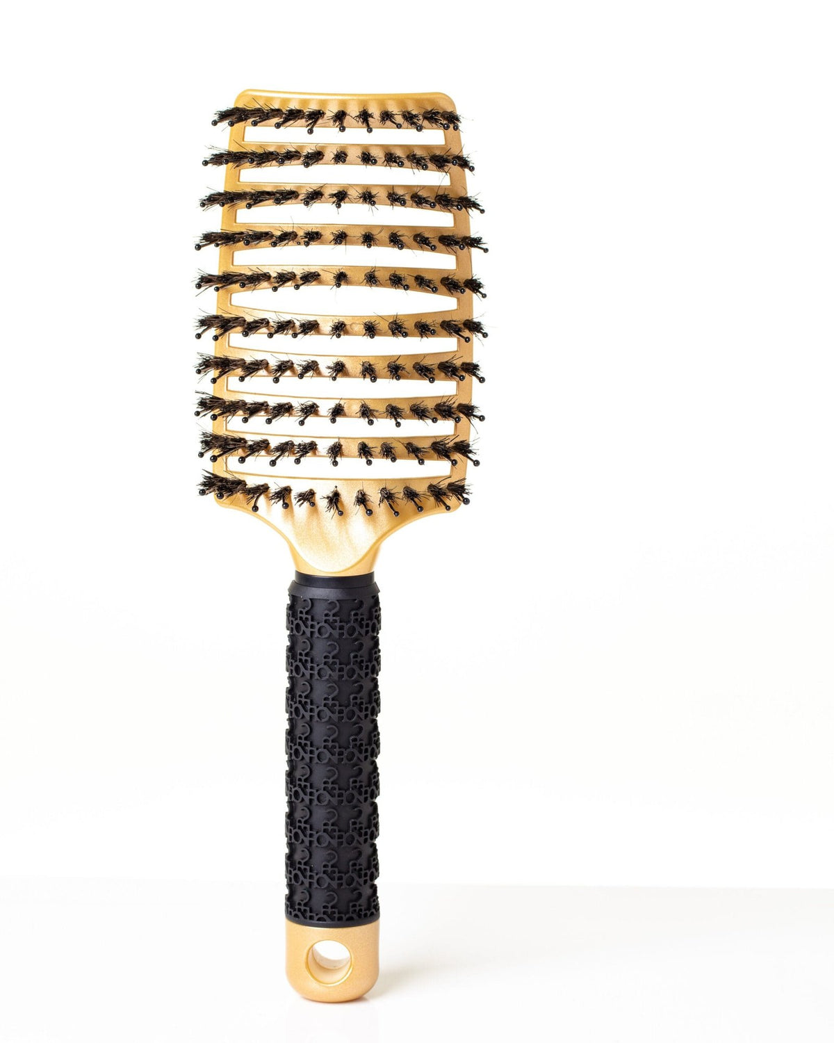 Golden-colored hair comb from the front