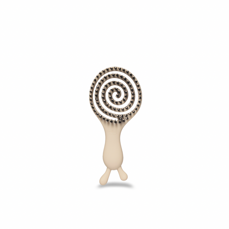 Cream-colored children's hair comb