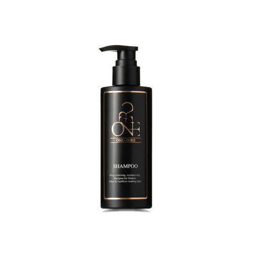 Gently cleansing ONE:ZERO shampoo in a black bottle with a dispenser